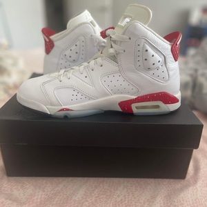 Red & white retro Jordan 6's.